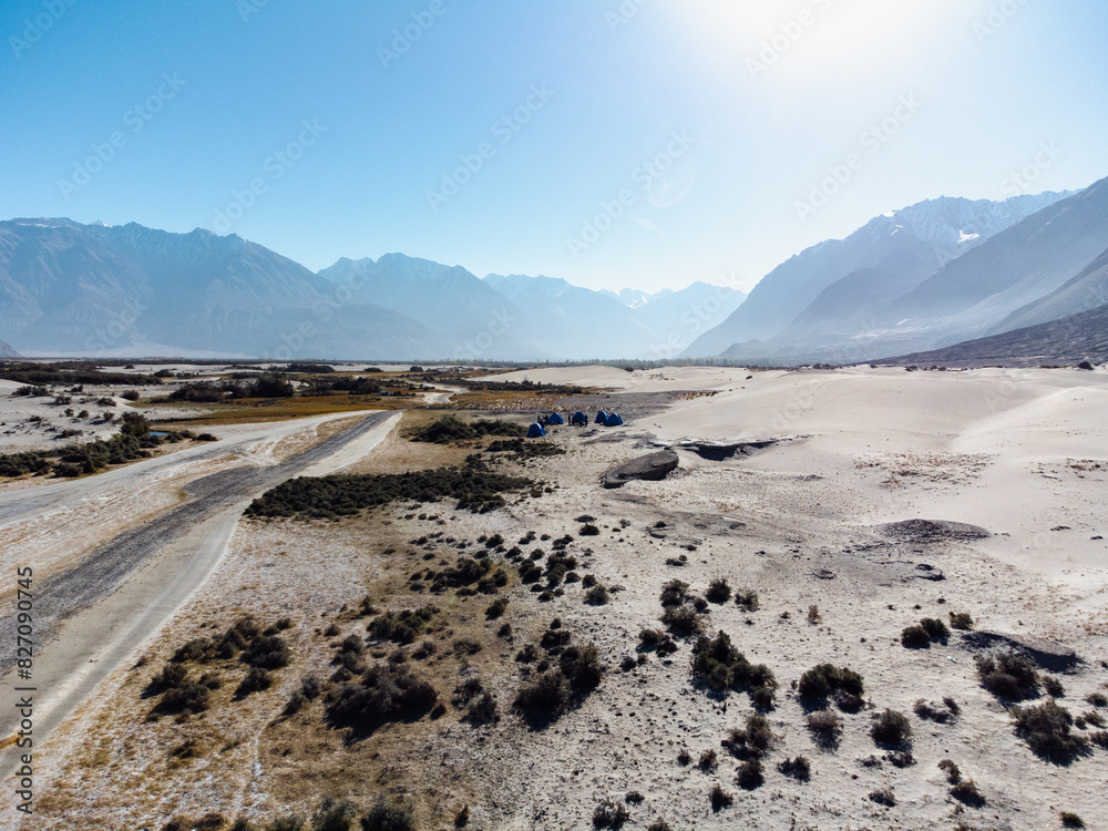 Arial View of Nubra, also called Dumra, is a historical region of Ladakh, India that is currently administered as a subdivision and a tehsil in the Leh district. Arial View of Nubra, also called Dumra, is a historical region of Ladakh, India that is currently administered as a subdivision and a tehsil in the Leh district.