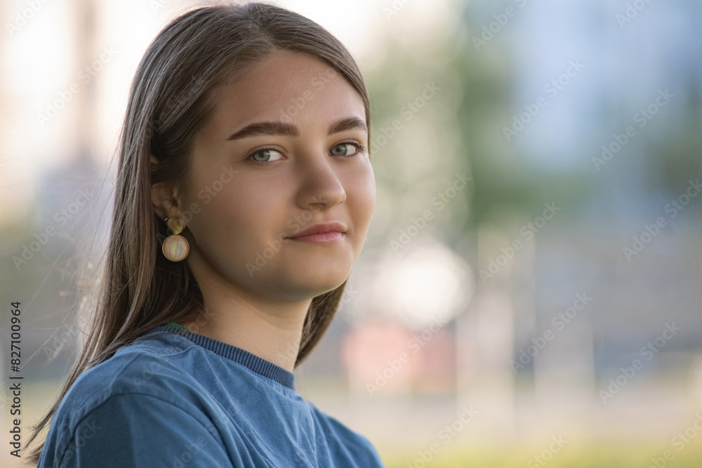 Portrait of a young beautiful long-haired girl outdoors. Portrait of a young beautiful long-haired girl outdoors.