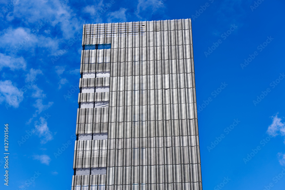 Looking up modern skyscraper of art school at Toni areal at industrial district of Swiss City of Zürich on a blue cloudy spring day. Photo taken May 24th, 2024, Zurich, Switzerland. Looking up modern skyscraper of art school at Toni areal at industrial district of Swiss City of Zürich on a blue cloudy spring day. Photo taken May 24th, 2024, Zurich, Switzerland.