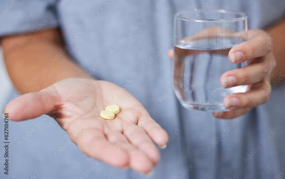 Home, water and hands of person with pills, vitamins and supplements as medication. House, patient and tablets as prescription for health, wellness and illness treatment for symptoms management Home, water and hands of person with pills, vitamins and supplements as medication. House, patient and tablets as prescription for health, wellness and illness treatment for symptoms management