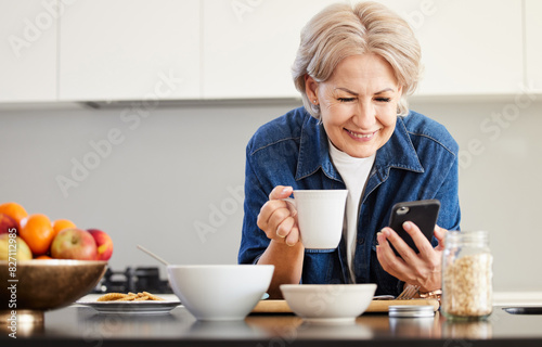 Senior woman, cellphone and happy for coffee in kitchen with video call and communication in morning. Technology, retirement and internet for connection with breakfast for conversation in apartment