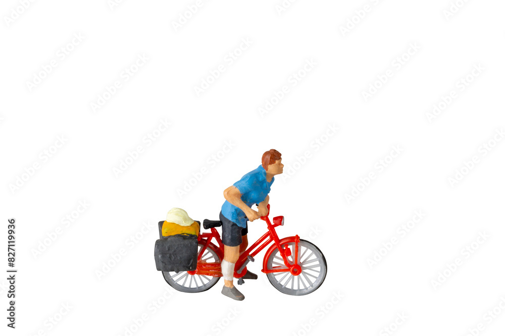 Miniature people ,Cyclist isolated on white background with clipping path Miniature people ,Cyclist isolated on white background with clipping path