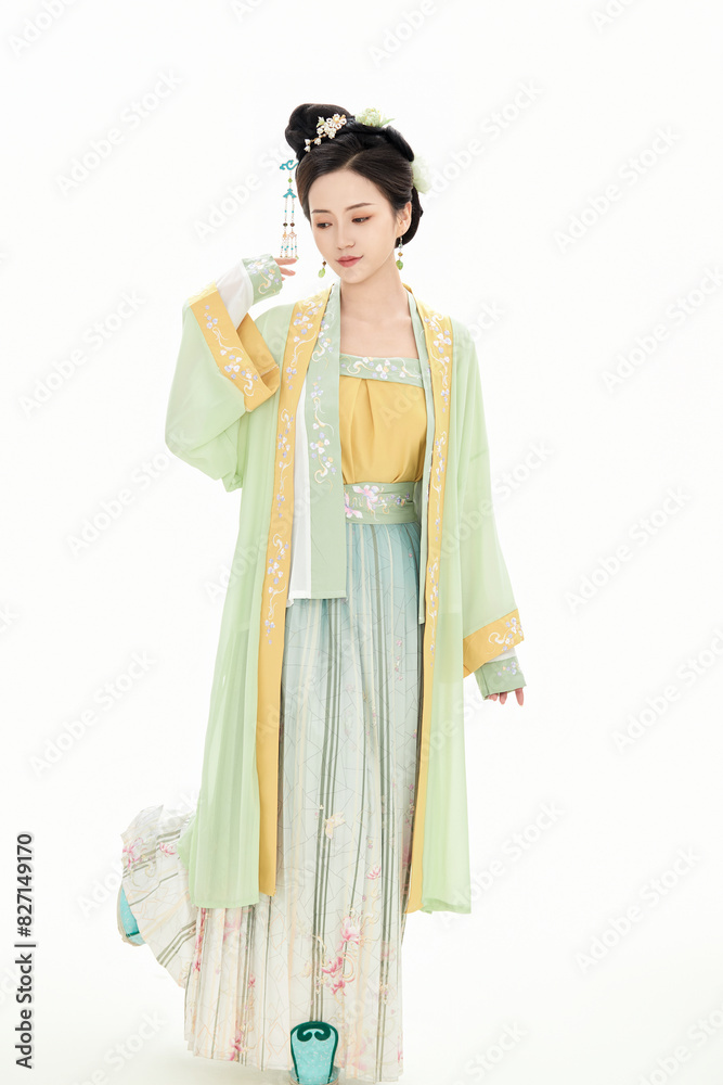 A woman wearing ancient Chinese clothing against a white background. A woman wearing ancient Chinese clothing against a white background.