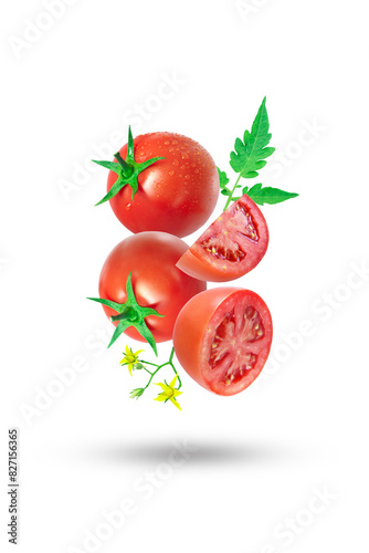Flying group tomato with slices and flower isolated on white background.