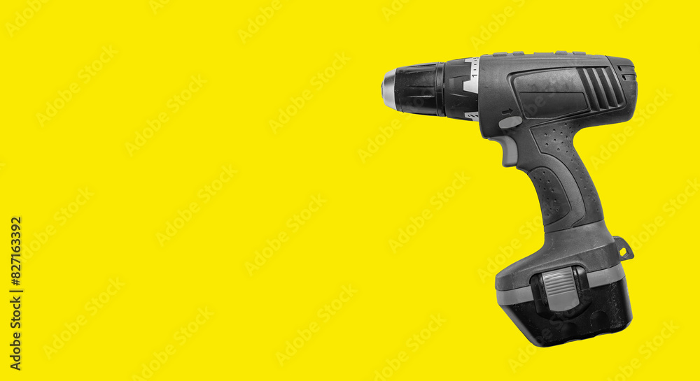 Electric screwdriver in construction and repair work. Industrial tool with handle, battery power, and modern design. Technology for builders, carpenters, and contractors. Fix Electric screwdriver in construction and repair work. Industrial tool with handle, battery power, and modern design. Technology for builders, carpenters, and contractors. Fix