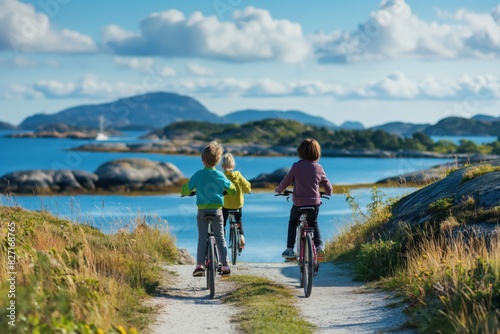 Family is seen from behind enjoying a leisurely bicycle ride along a picturesque coastal pathway on a sunny day © Татьяна Евдокимова