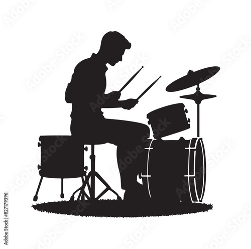 A drummer musician drumming drums in detailed silhouette