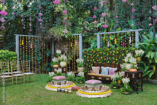 Indian wedding stage setup in a garden outdoors