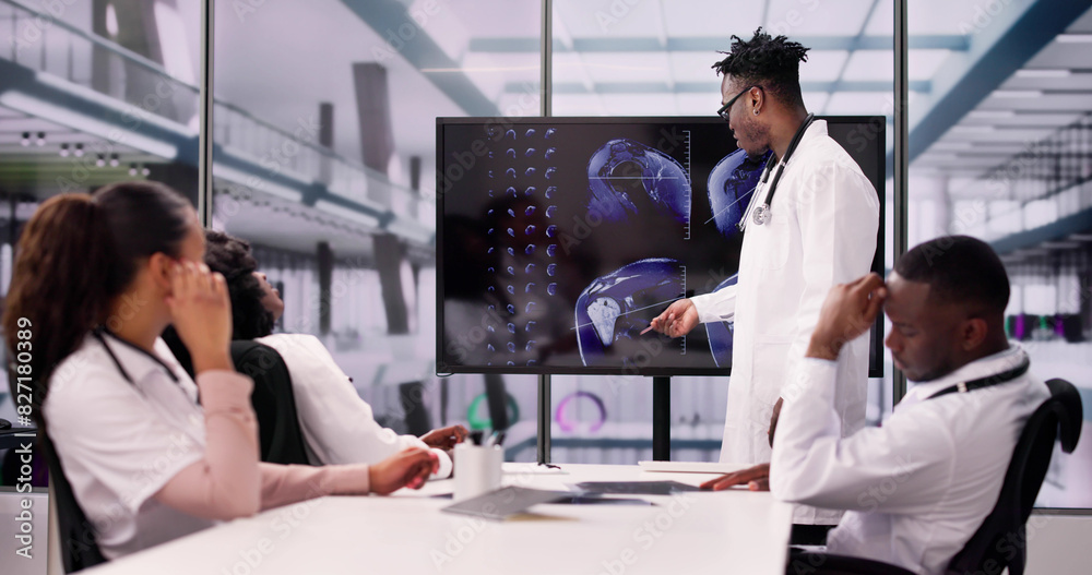Physician Looking At Shoulder MRT Scan