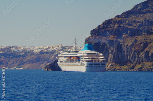 Dream holiday vacation to Greek Island Santorini during Summer Mediterranean Aegean cruising on Celestyal breathtaking nature landscape scenery photo