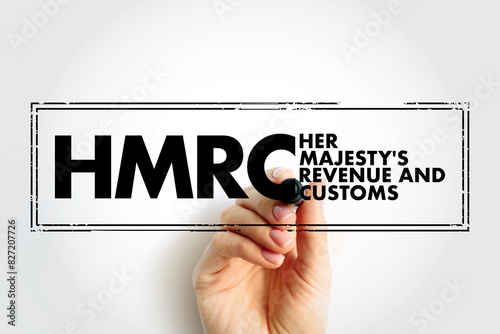 HMRC Her Majesty's Revenue and Customs - non-ministerial department of the UK Government responsible for the collection of taxes,  acronym text concept stamp