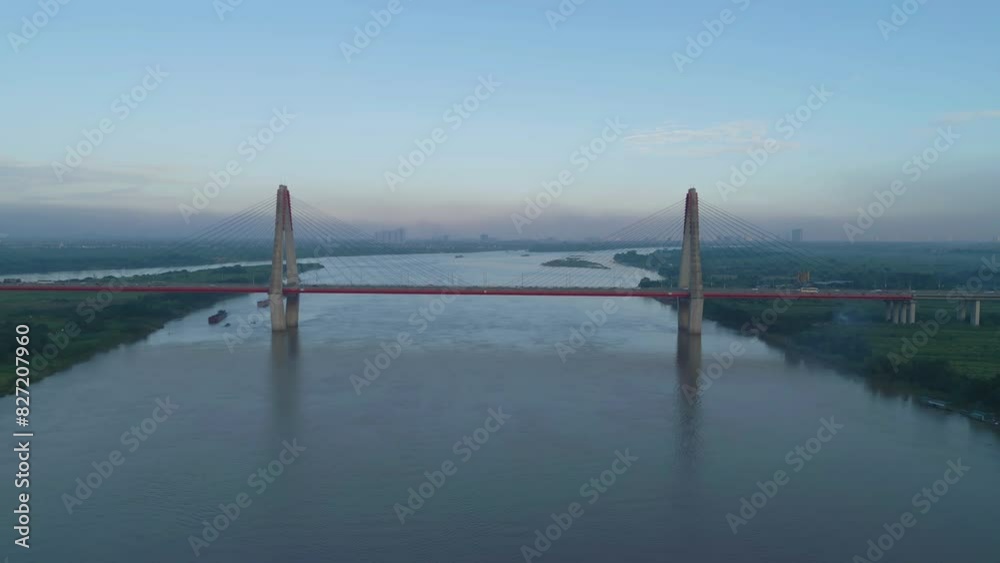 Aerial view of Cau Nhat Tan Cable Bridge or Vietnam–Japan Friendship Bridge crossing the Red River in Hanoi City, Vietnam. Tourist attraction landmark. Aerial view of Cau Nhat Tan Cable Bridge or Vietnam–Japan Friendship Bridge crossing the Red River in Hanoi City, Vietnam. Tourist attraction landmark.
