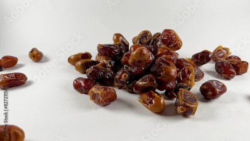 slow motion shot of falling dates, closeup of fard dates, fresh dates 