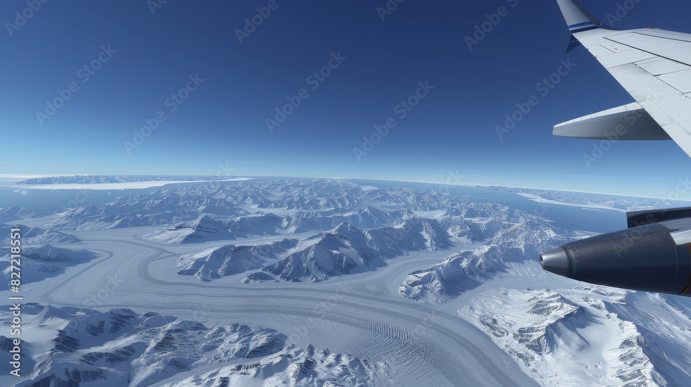 An aerial view airplane soaring over a vast expanse of icy tundra, with glaciers and frozen lakes visible below An aerial view airplane soaring over a vast expanse of icy tundra, with glaciers and frozen lakes visible below