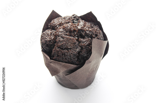 Chocolate muffin close up isolated on white background