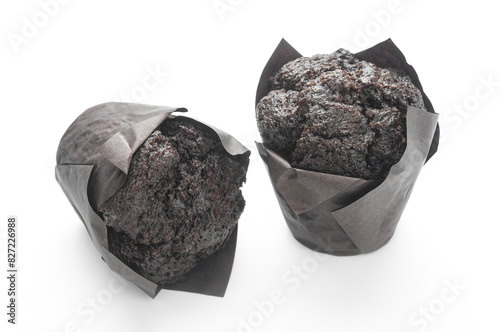 Chocolate muffins close up isolated on white background