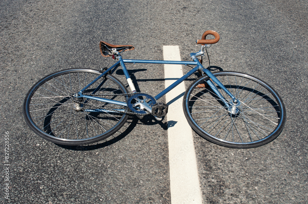 Stylish fixed gear bicycle on a asphalt roadway