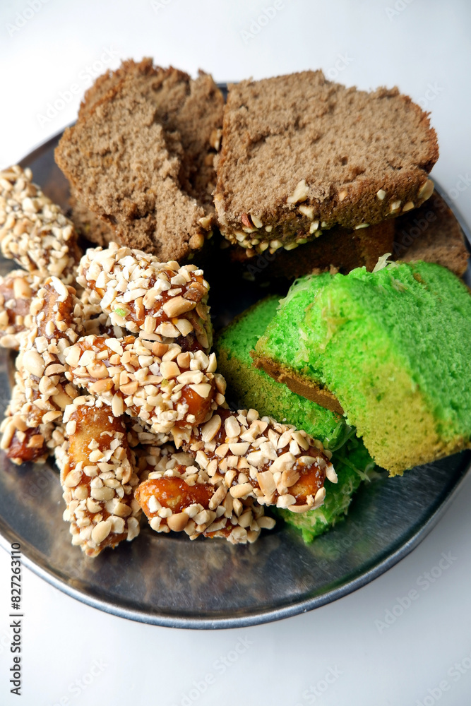 the peanut cake and green and chocolate sponge cake were so soft and delicious nestled on the plate the peanut cake and green and chocolate sponge cake were so soft and delicious nestled on the plate