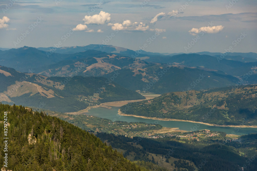 Fototapeta premium Aerial view of mountains from summit in Izvorul Muntelui Lake
