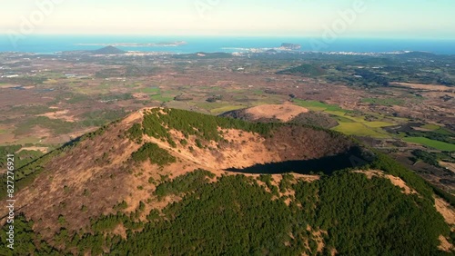 Drone shot of Darangshi Oreum(volcanic cone) on Jeju Island, South Korea. photo