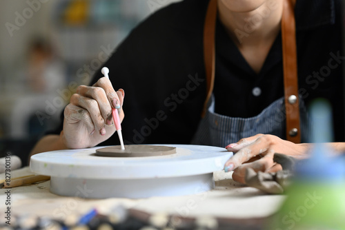 Close-up image of a Young artist working on clay sculpture in art studio, DIY with creative people, Handcraft artwork concepts