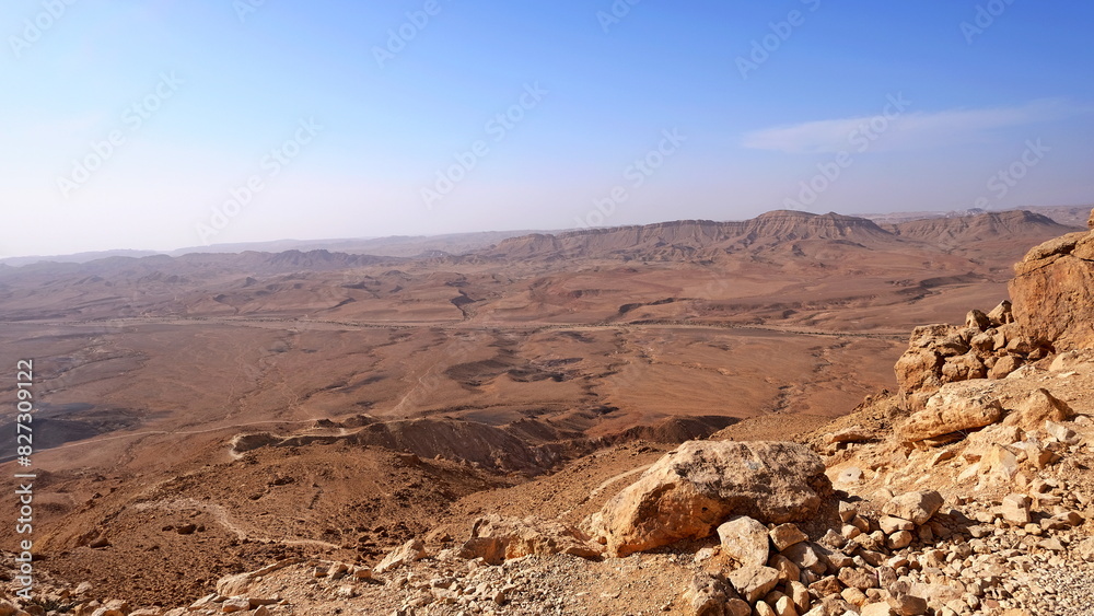Fototapeta premium Makhtesh Ramon is a geological feature of the Israeli Negev Desert. Situated approximately 85 km south of the city of Beersheba, this landform represents the world's largest erosion circus. The format