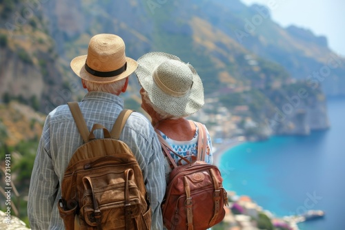 Happy senior couple on summer vacation, enjoying scenic cityscape and beautiful view of the sea