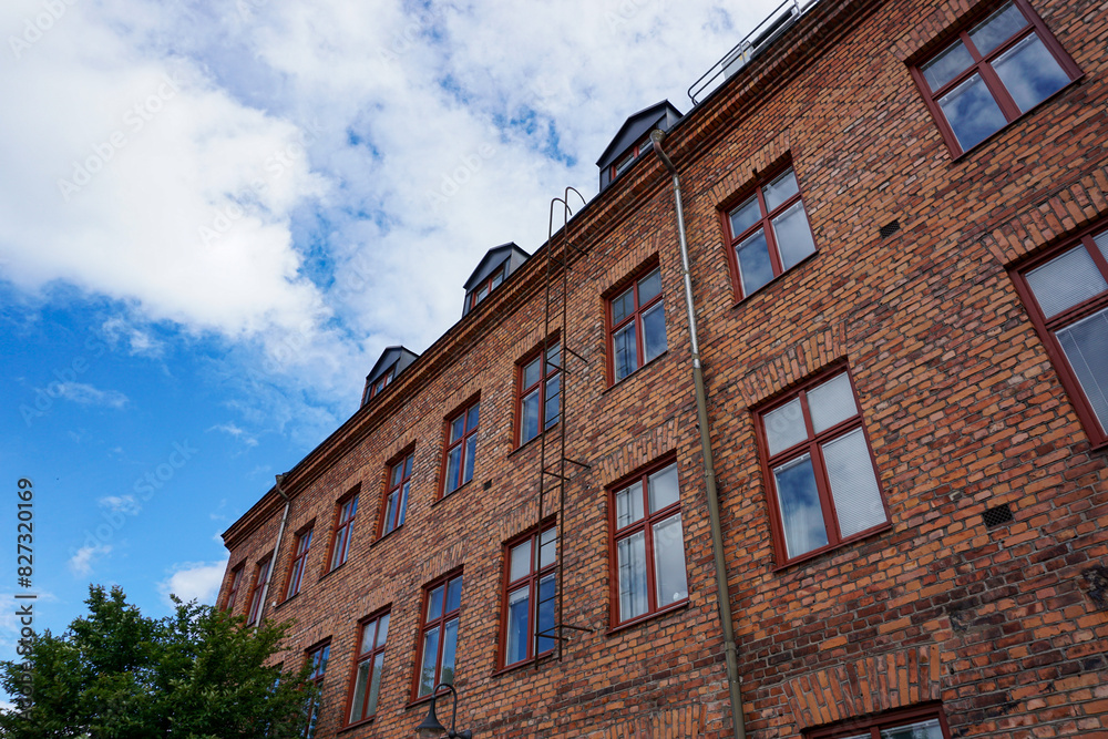 Fototapeta premium Low angle view of a brick building against the sky