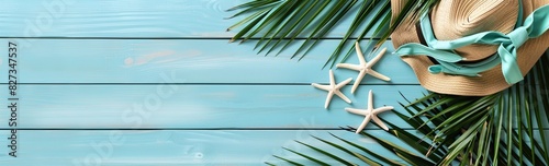 Beach background with shell accessories, starfish and straw hats on wooden floor. photo