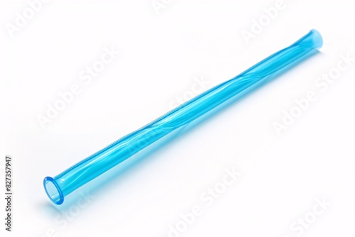 Slim Clear Straw with Blue End on White Background photo