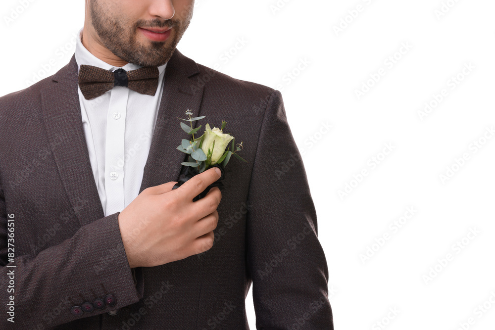 Groom with boutonniere on white background, closeup. Wedding accessory Groom with boutonniere on white background, closeup. Wedding accessory