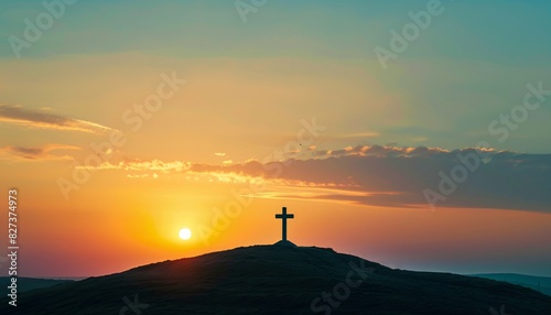 Sunset Silhouette of Cross and Hilltop