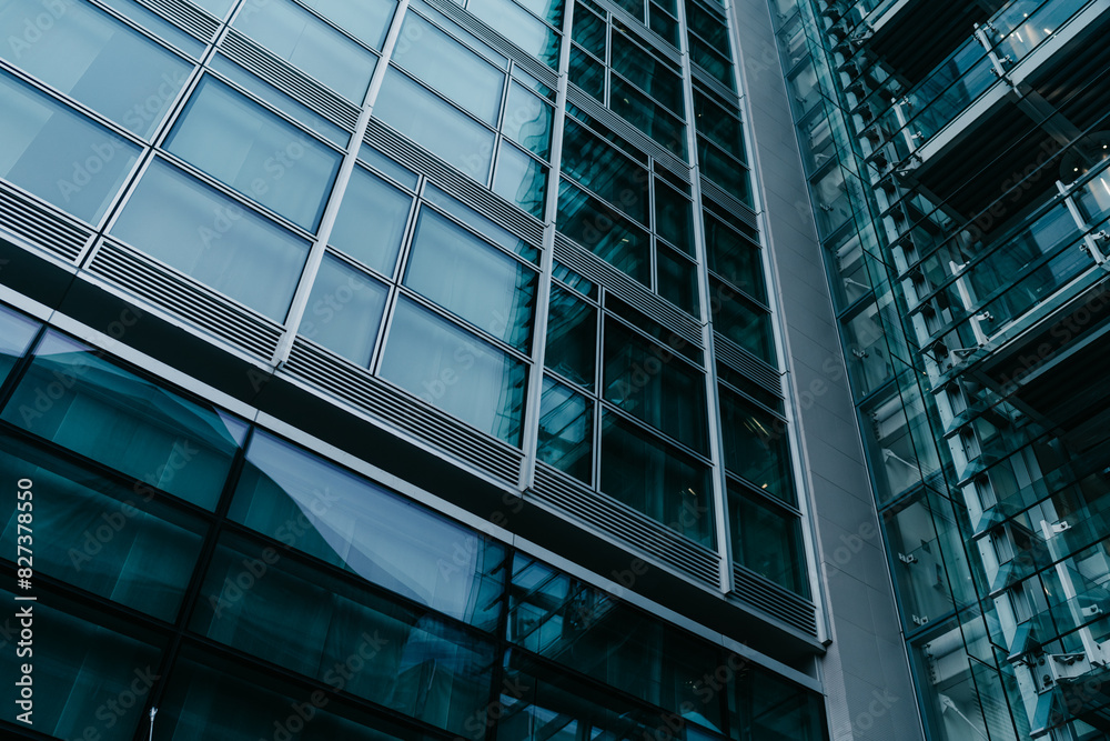 Modern glass building exterior with reflections Modern glass building exterior with reflections