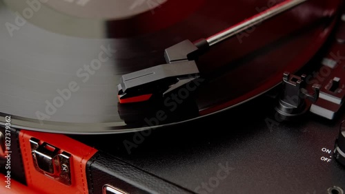 A highresolution image showcasing a vinyl record spinning on a turntable, perfect for musicrelated content photo