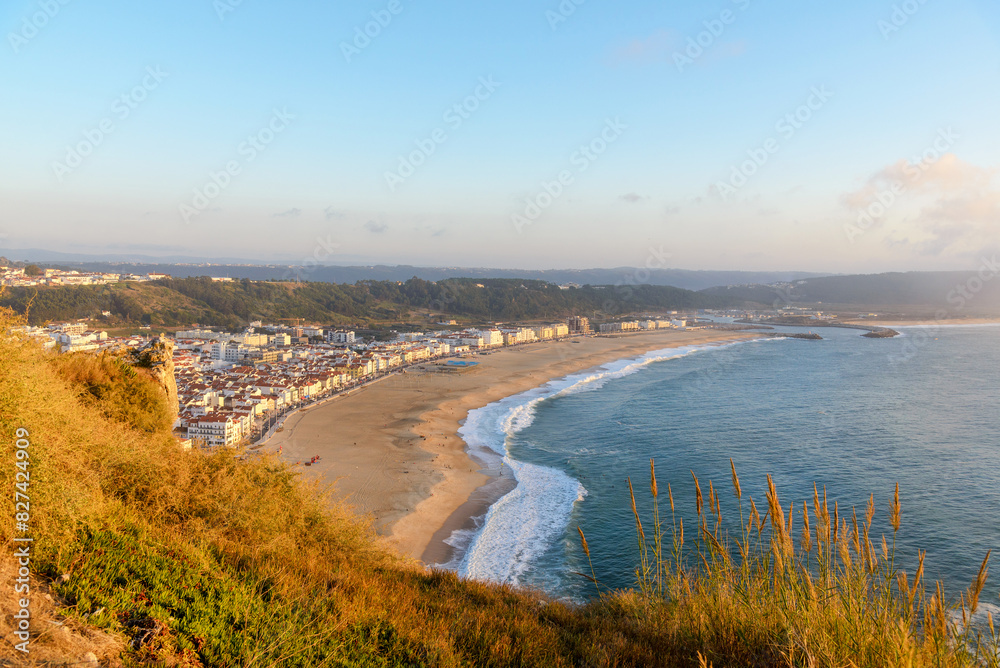 Aerial view of Nazare city and Praia da Nazare Beach, Portugal Aerial view of Nazare city and Praia da Nazare Beach, Portugal