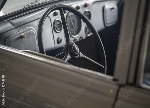 Dashboard and steering wheel of old-timer car