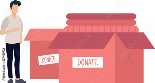 The boy is looking at the donation boxes.