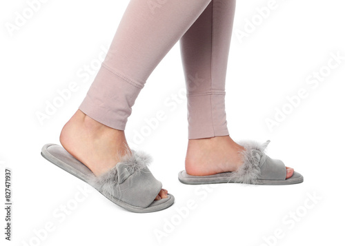 Woman in grey soft slippers on white background, closeup