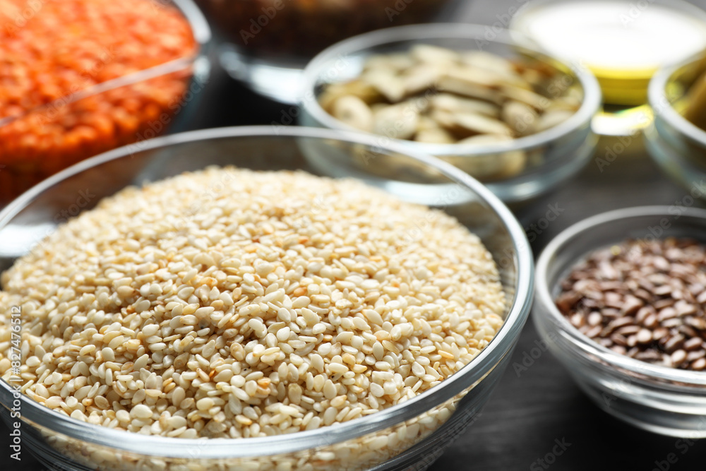 Sesame seeds in bowl on table, closeup. Healthy fats Sesame seeds in bowl on table, closeup. Healthy fats