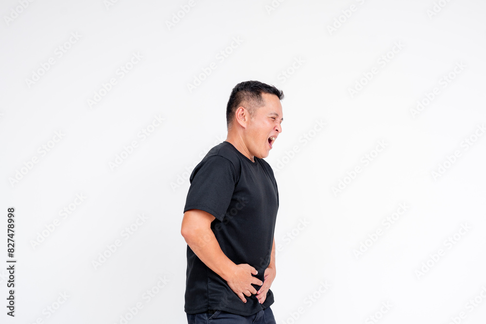 A man holding his bladder, enduring an intense need to pee, with no bathroom in sight. Concept isolated on a white background. A man holding his bladder, enduring an intense need to pee, with no bathroom in sight. Concept isolated on a white background.