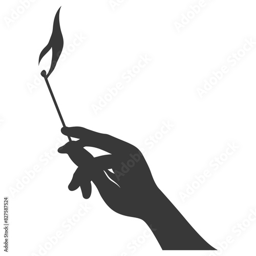 Silhouette hand holding burning match black color only