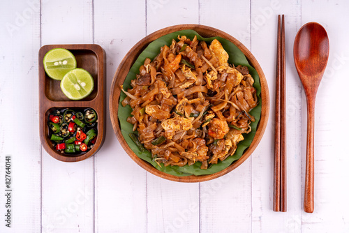 Photography High angle view of char kway teow fried flat noodle with condiment