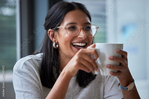 Business woman  face and break with coffee in office  agency and news company. Laughter  publisher and drink cup of tea for joke  lunch and happiness for thinking of vision  ideas or startup energy