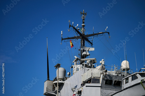 Flag of Spain flying on the communications tower of a navy ship