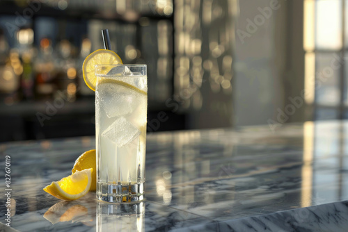 Refreshing Tom Collins Cocktail on Marble Countertop photo