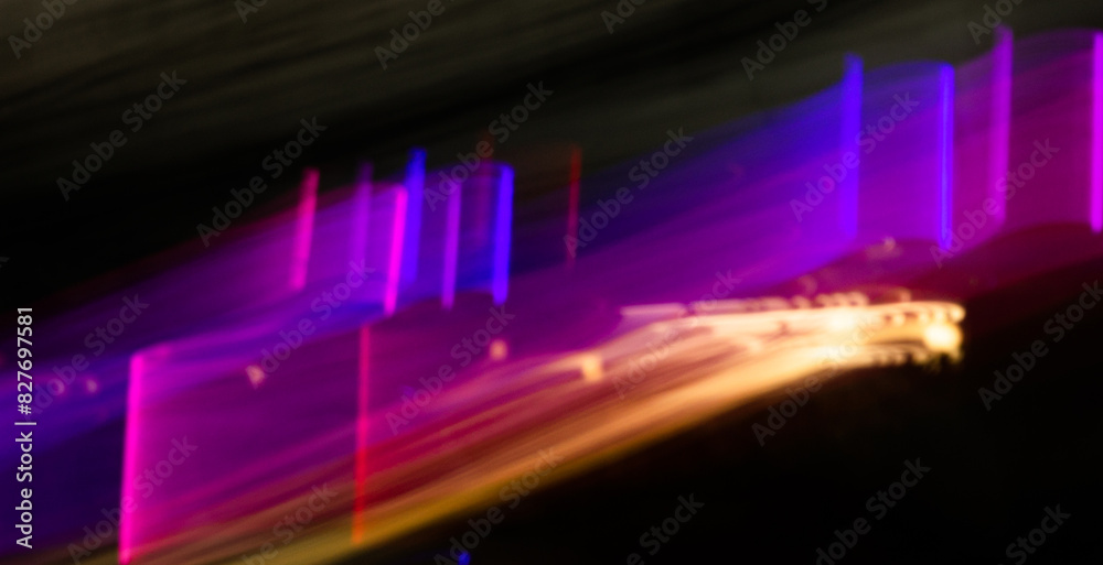 A blurry image of a guitar with purple and orange colors. The image has a dreamy and surreal feel, psychedelic style art A blurry image of a guitar with purple and orange colors. The image has a dreamy and surreal feel, psychedelic style art