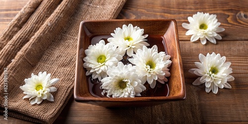 White Daisies on a Wooden Plate with Brown Towel