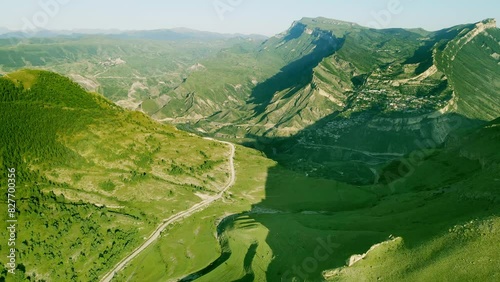 Gunib village in the mountains of Dagestan, Caucasus, Russia. Aerial drone view. Summer landscape at sunrise.
 photo