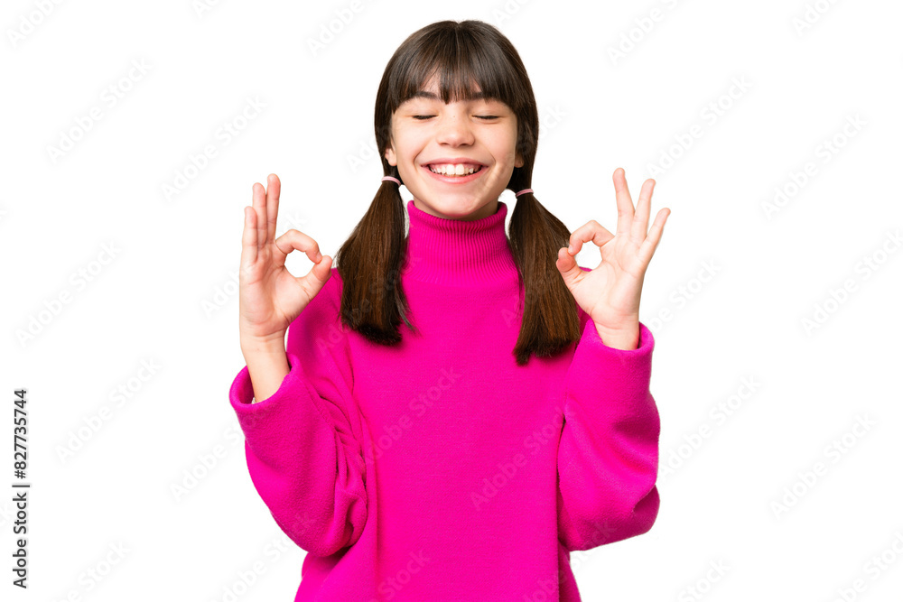 Little caucasian girl over isolated background in zen pose Little caucasian girl over isolated background in zen pose