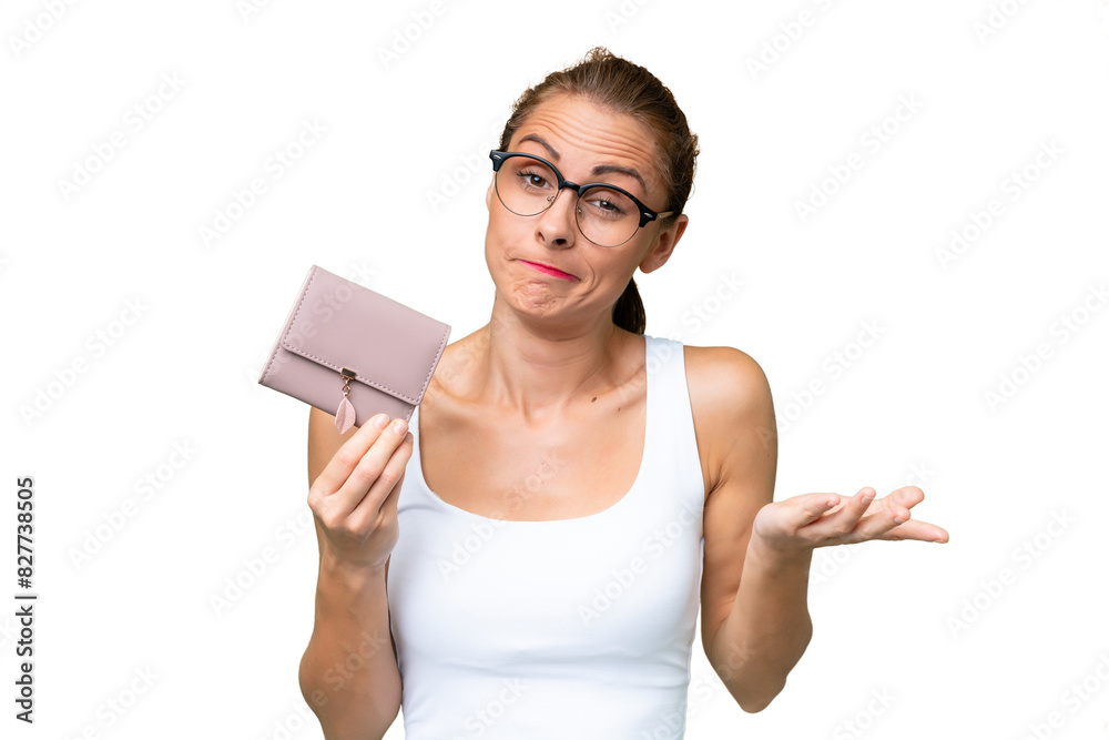 Young caucasian woman holding a wallet over isolated background making doubts gesture while lifting the shoulders Young caucasian woman holding a wallet over isolated background making doubts gesture while lifting the shoulders